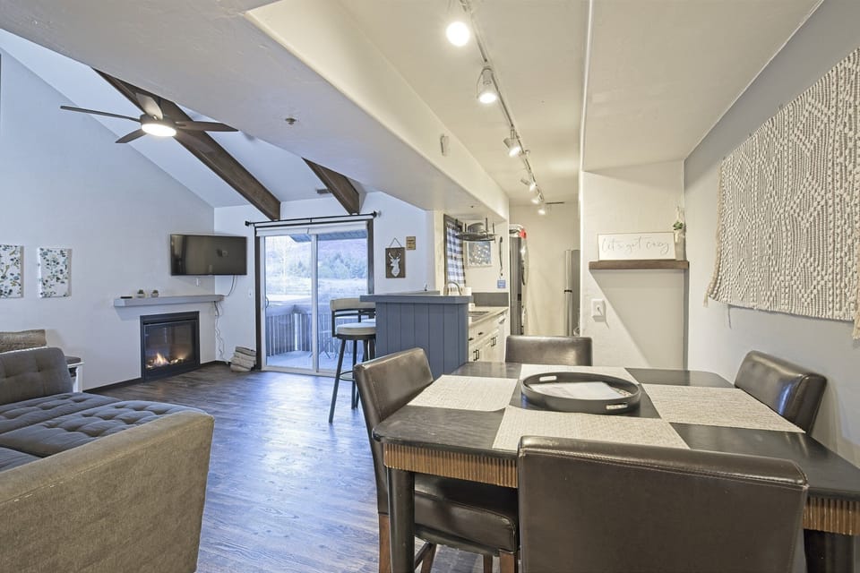 Bright, inviting living space with comfortable seating and a warm fireplace for cozy mountain evenings.