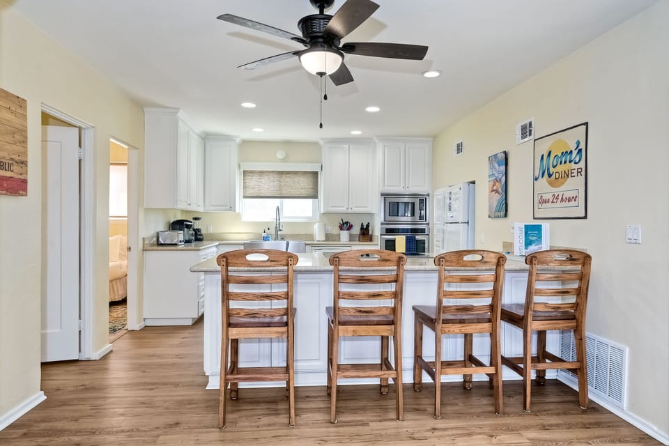 Head into the kitchen with breakfast bar seating