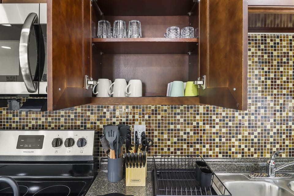 Glasses, coffee mugs and cups and other cooking utensils you may need