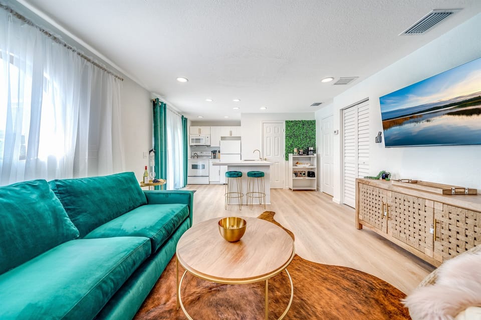 View of living room, dining room, and kitchen