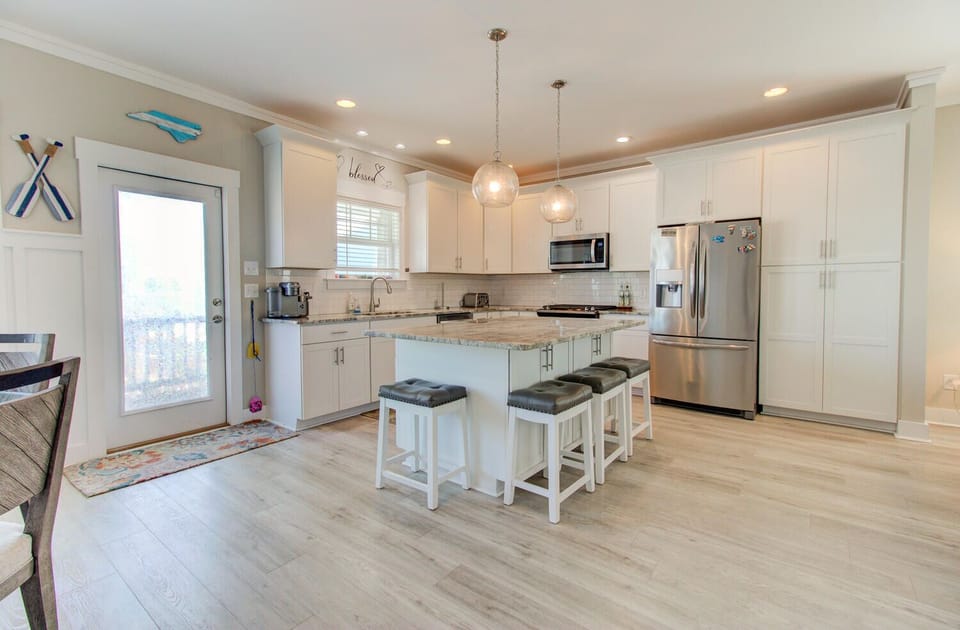 Kitchen island has seating for four