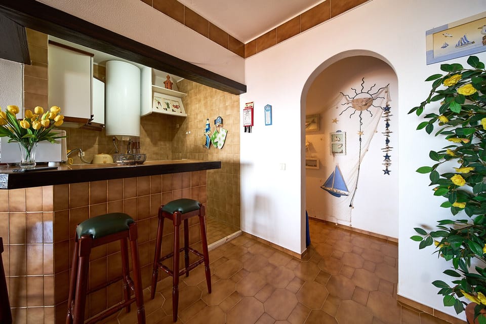 The passageway leads to the bedrooms of Casa Oystra.