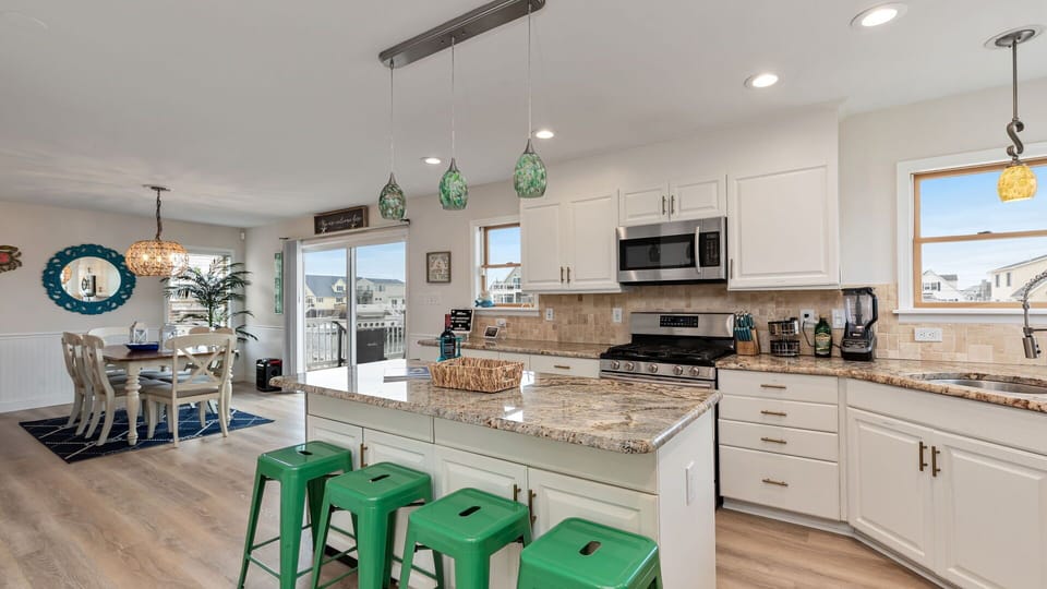 Kitchen appliances and island visible in this picture.