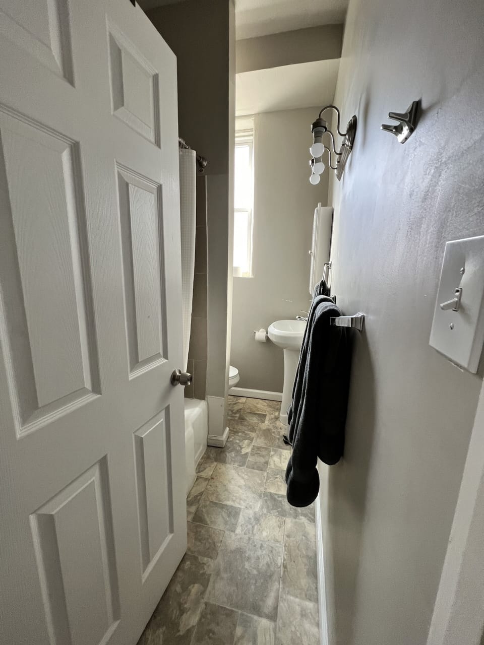 Full bathroom with bath/shower combo