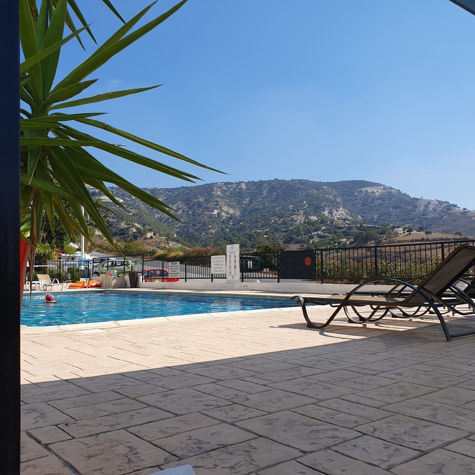 swimming pool with mountain views.