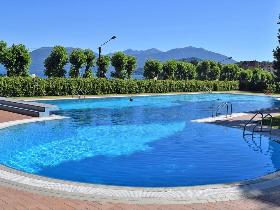Water, Sky, Blue, Swimming Pool, Azure, Tree, Natural Landscape, Leisure, Plant, Shade