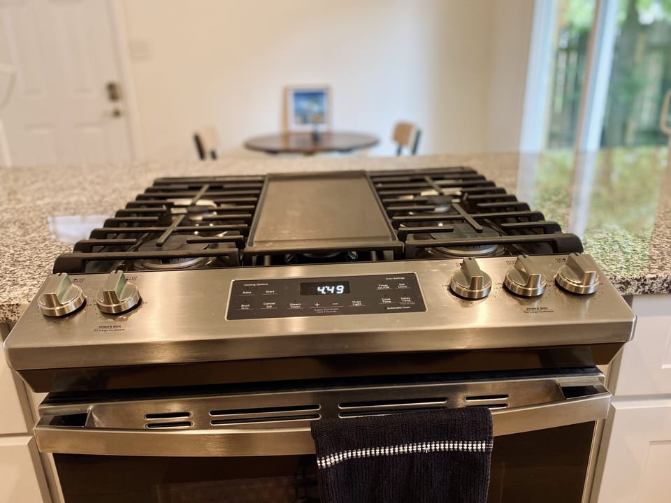 Brand new gas range with 5 burners and a griddle