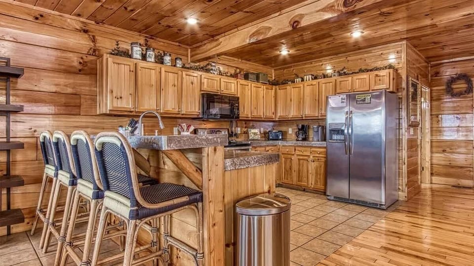Whip up culinary magic in this gourmet kitchen with rustic charm and modern amenities!