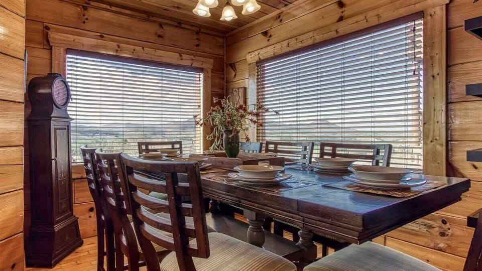 Gather 'round a rustic table with mountain views and charming decor!