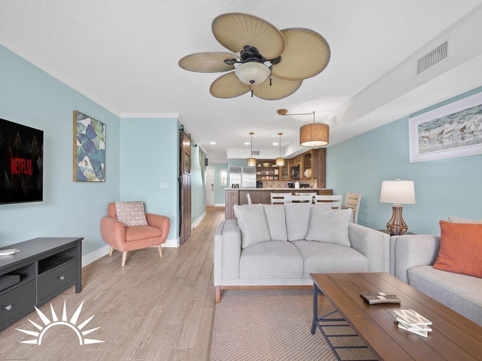 living area with view of kitchen and dining