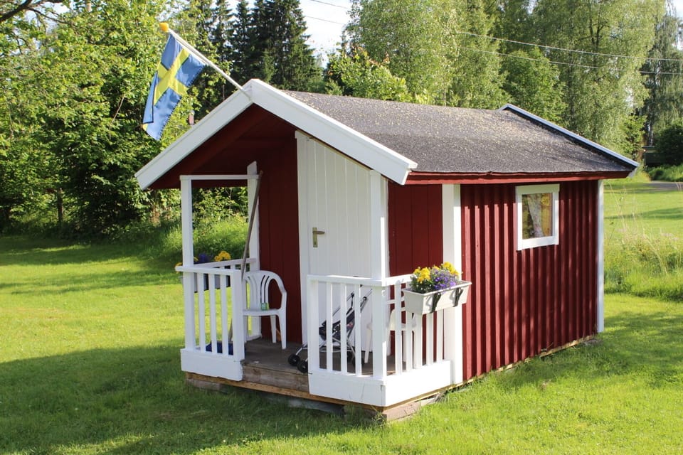 Playhouse with a kitchen and other toys.