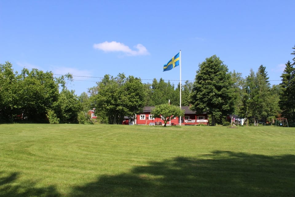 View of the house and large lawn area (view from lake). 