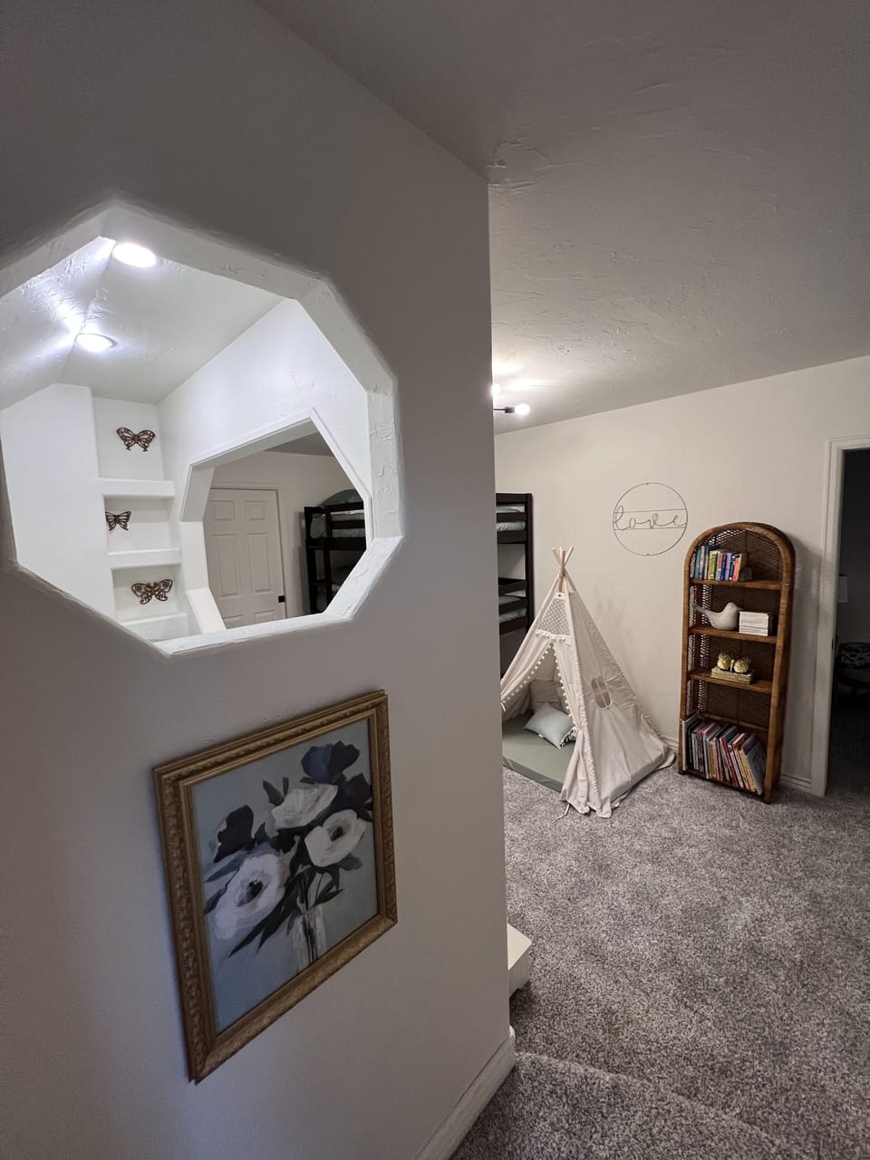 The 1st room is perfect for the kids featuring 4 twin beds. 
