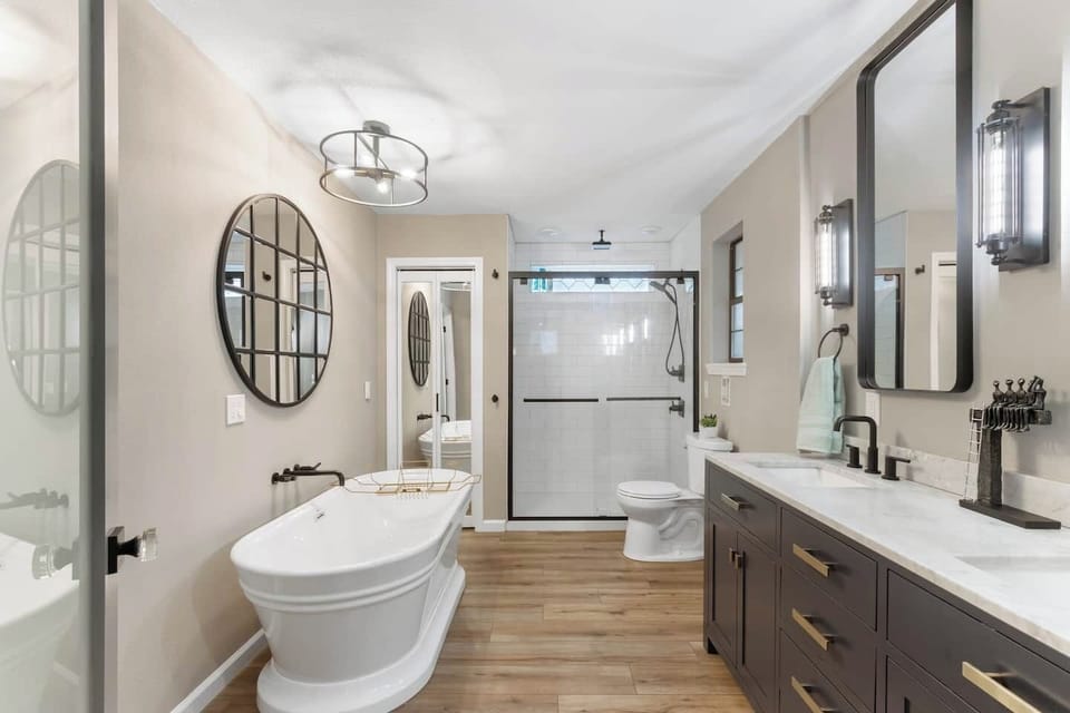 Full bath with double vanity, soaker tub and large shower