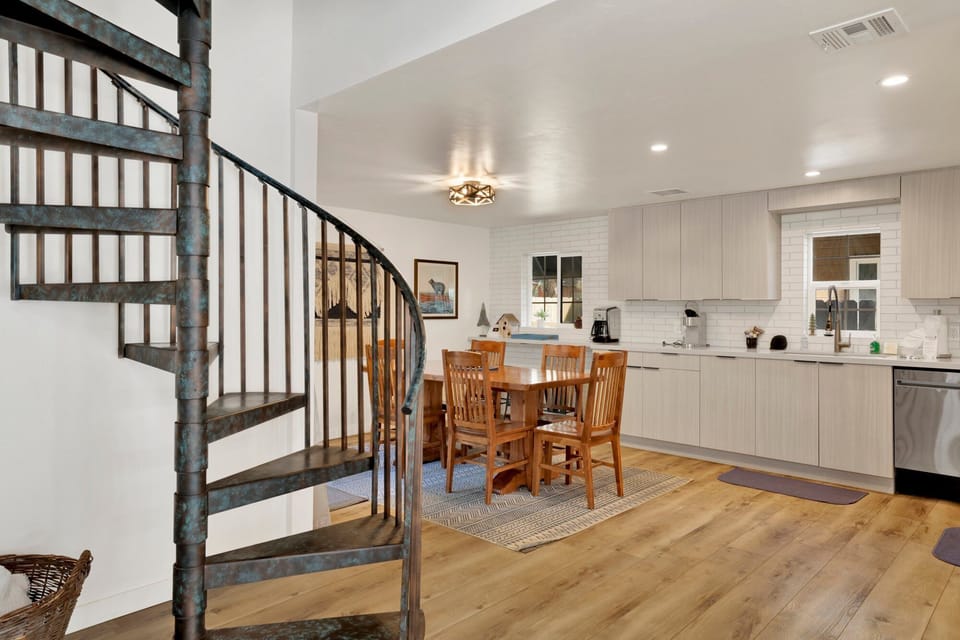 Inviting dining area designed for comfort and connection. The space feels open and airy, with a warm atmosphere that makes everyday meals and special gatherings equally enjoyable.