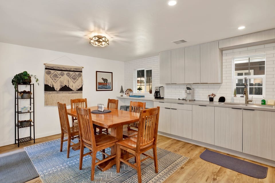 Inviting dining area designed for comfort and connection. The space feels open and airy, with a warm atmosphere that makes everyday meals and special gatherings equally enjoyable.