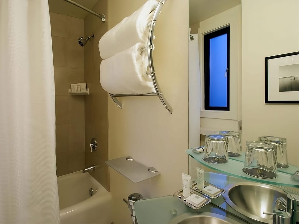Rinse off in the clean tub-shower after a long day.
