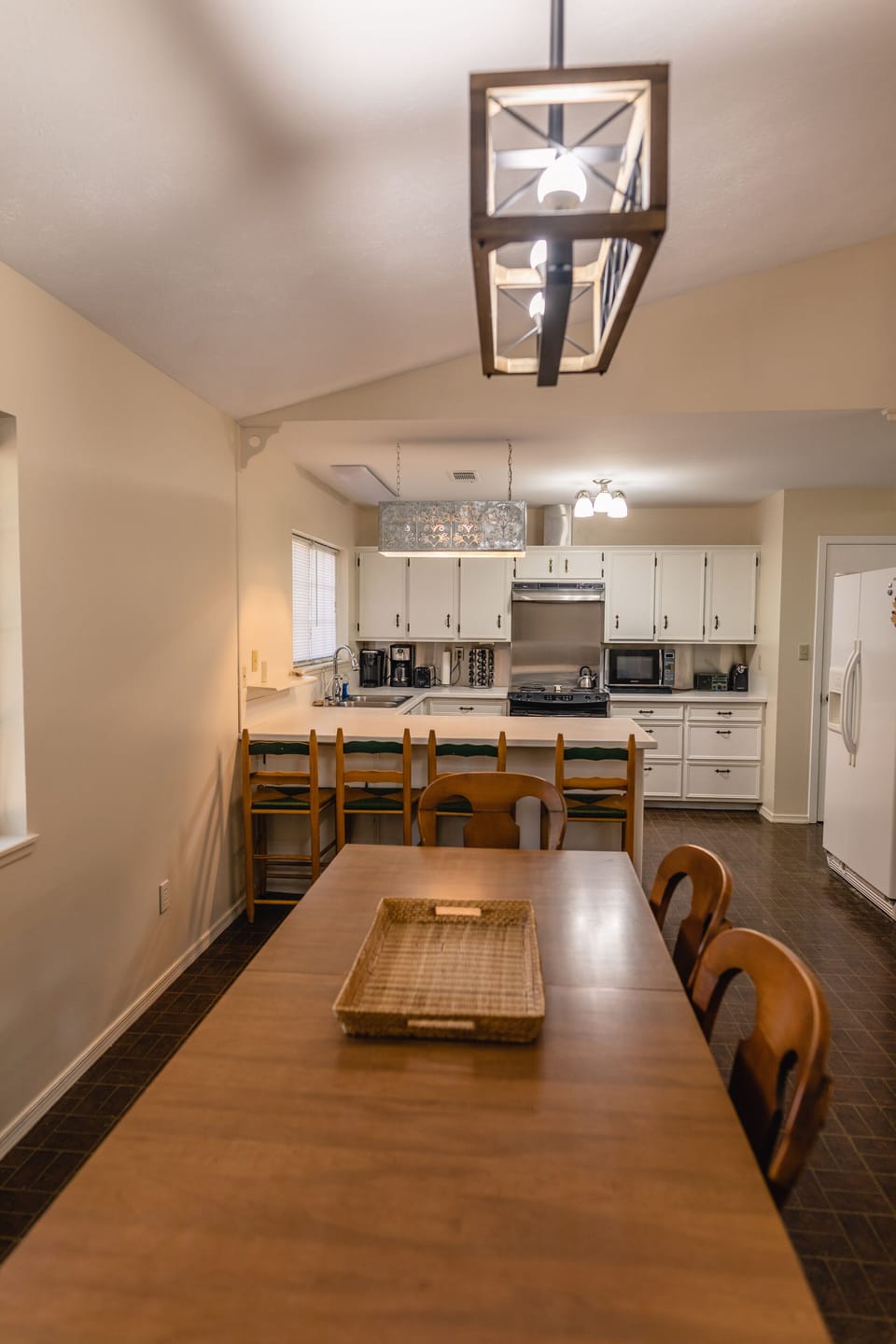 View of kitchen from dining table
