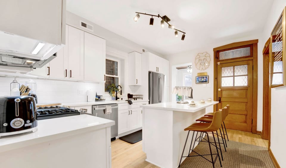 Eat-in kitchen featuring large 3-person kitchen island.