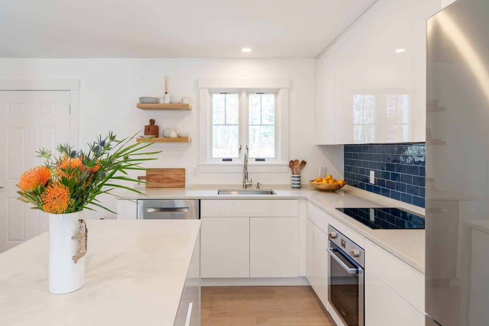 Kitchen has Bosch Stainless Steel Appliances and Electric Stove