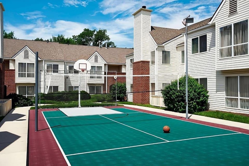 Play a quick game outdoors on the on-site sport court.
