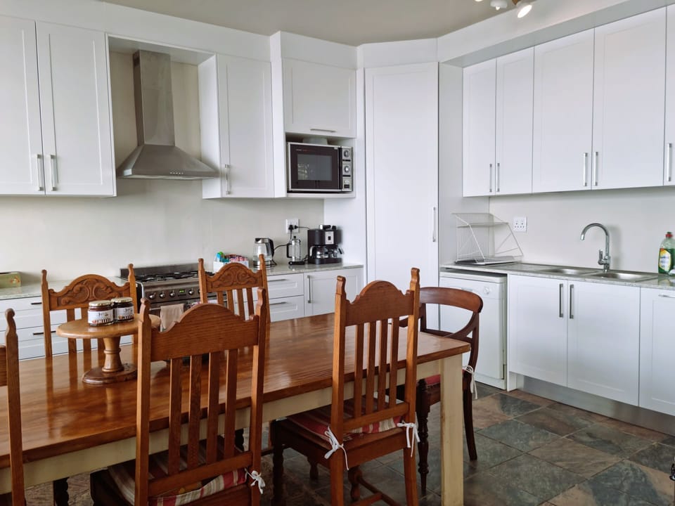 The dining table and the kitchen