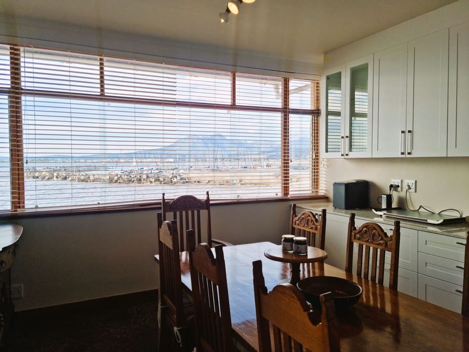 The dining table and the kitchen