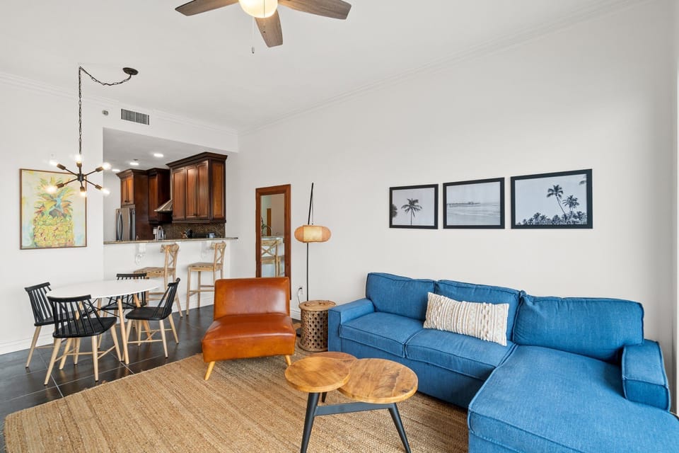 Spacious living area with chic furniture and nautical touches