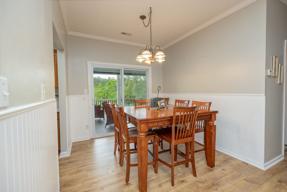 The dining table has enough seating for six people.