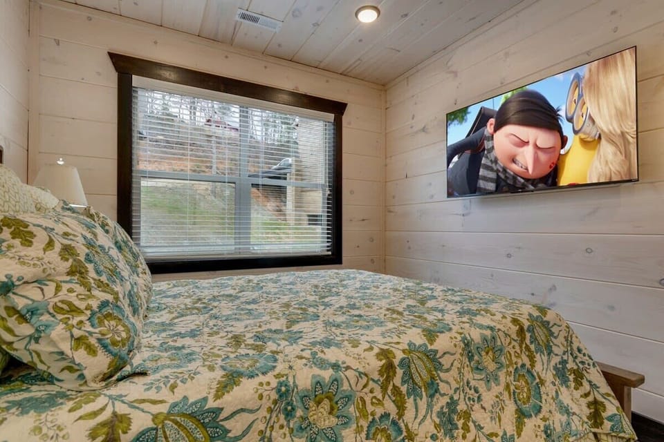 Upstairs Bedroom  - Queen Size Bed with 55" Smart TV with multiple streaming apps.  Private Ensuite attached.
