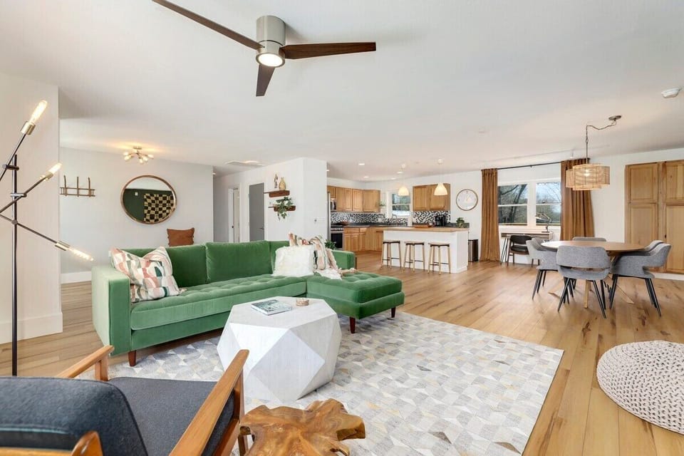 When you enter our home, you'll immediately be greeted by our open-concept kitchen, dining and living room area.