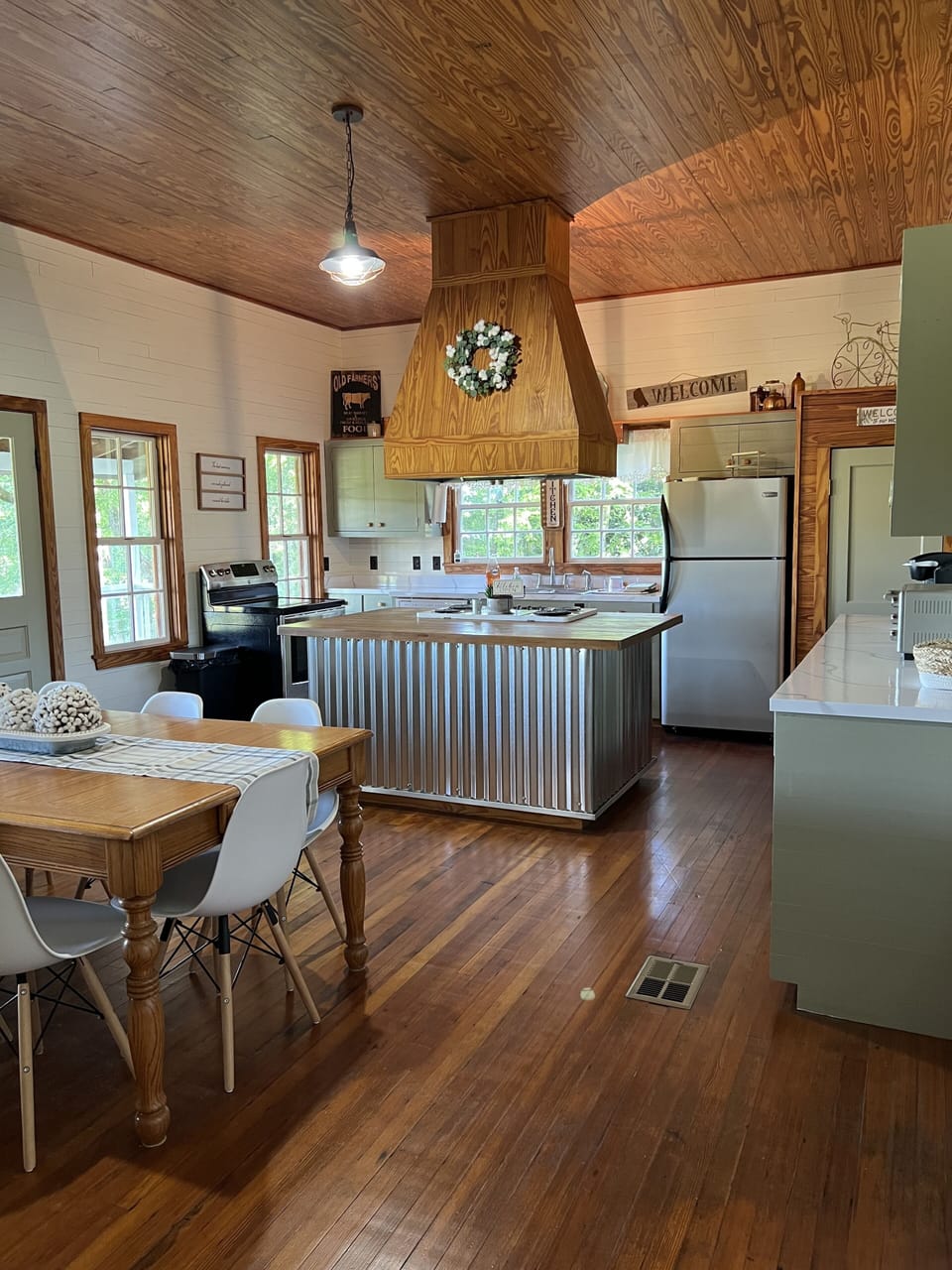 Equipped with a full kitchen - toaster, stove top, range & hood, and dishwasher