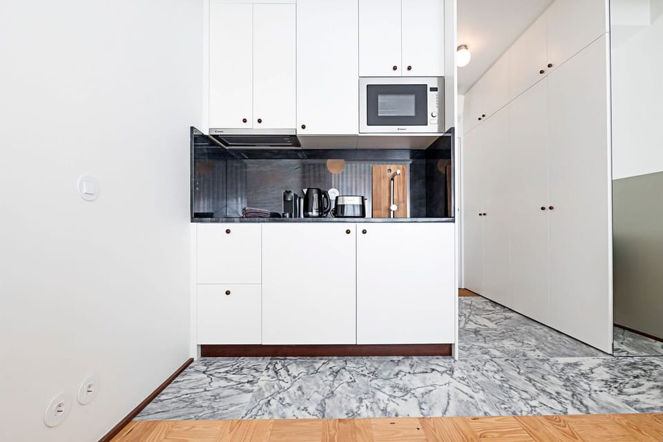 Practical kitchenette equipped with all the appliances required for your basic needs, during your stay #modern #charming
