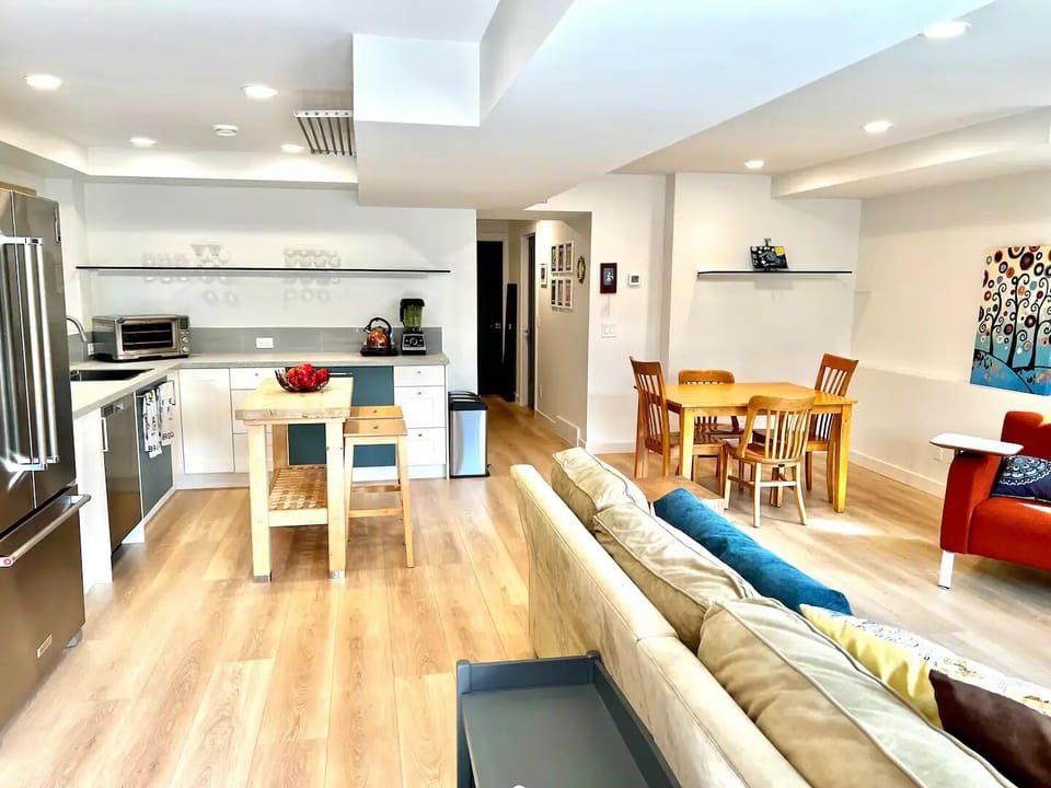 Enter the great room 4 spaces: Entry drop zone, kitchen, dining, living.