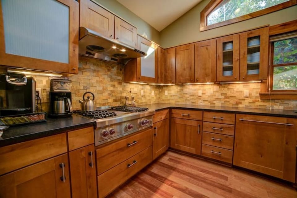 Natural light pours through the large custom windows and skylights.