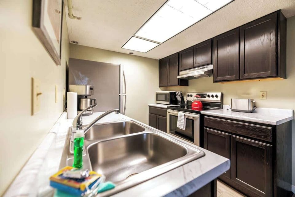 Immerse yourself in culinary delights and shared moments at the core of this 3-bedroom condo