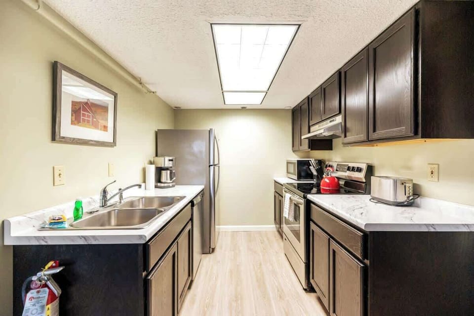 Immerse yourself in culinary delights and shared moments at the core of this 3-bedroom condo