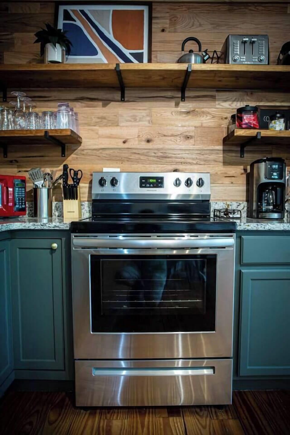 Cook up a meal with the electric stove and oven in the kitchen!