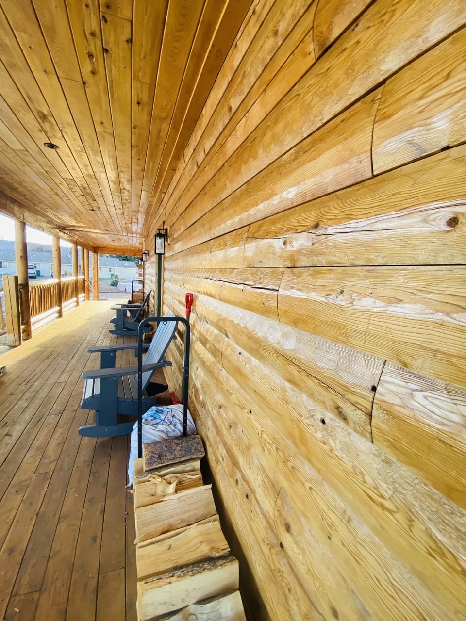 The covered deck, along the front of the cabin 