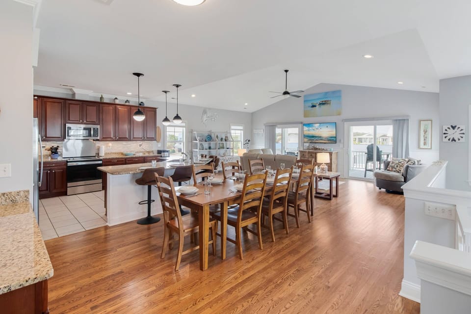 On the Upper Level, the Open Plan (Kitchen/Dining/Living area) allows a Seamless Flow for Family or Group Gatherings.