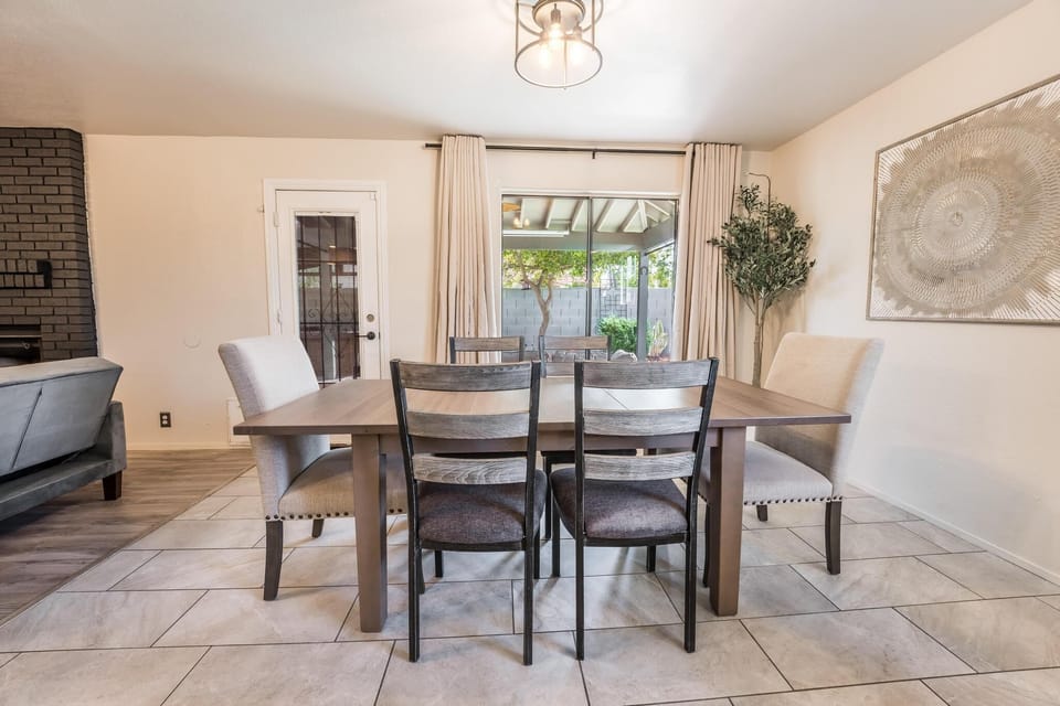 Dining area with access to backyard patio.