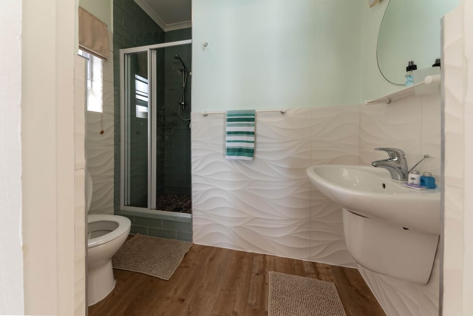 A bathroom with a shower