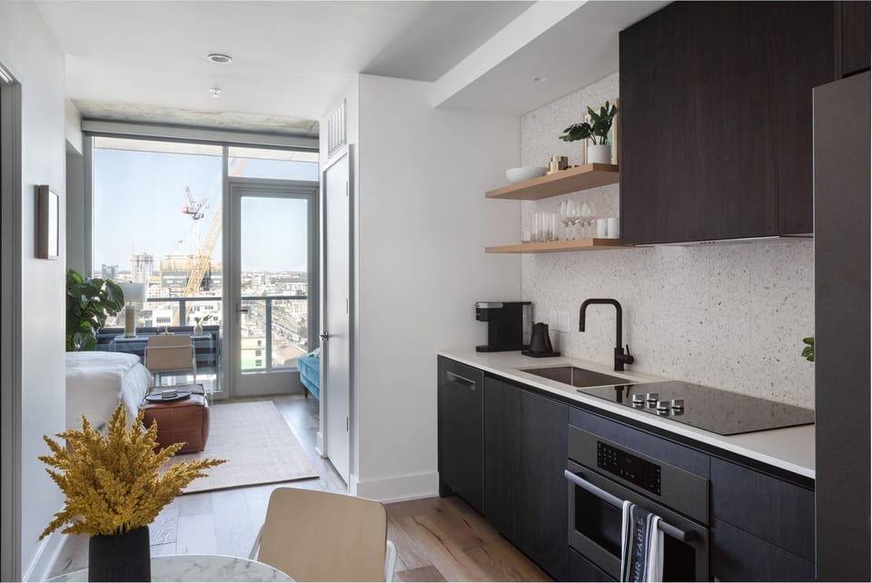 A compact yet fully equipped kitchen designed. for modern stay.