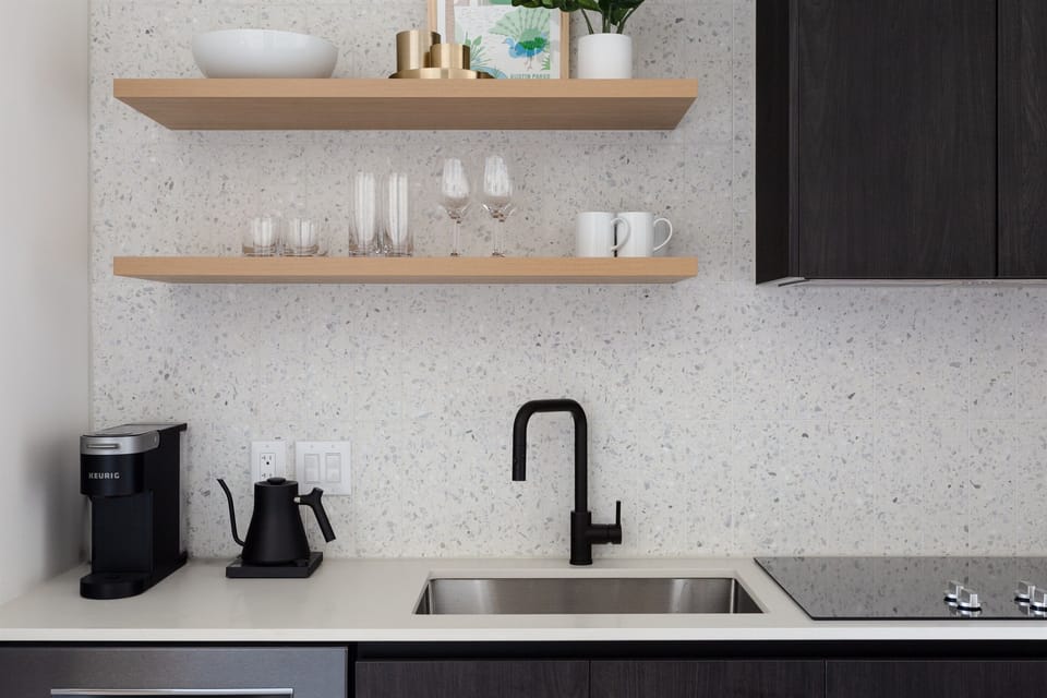 Brew & Cook: Coffee corner near kitchen sink and stove.