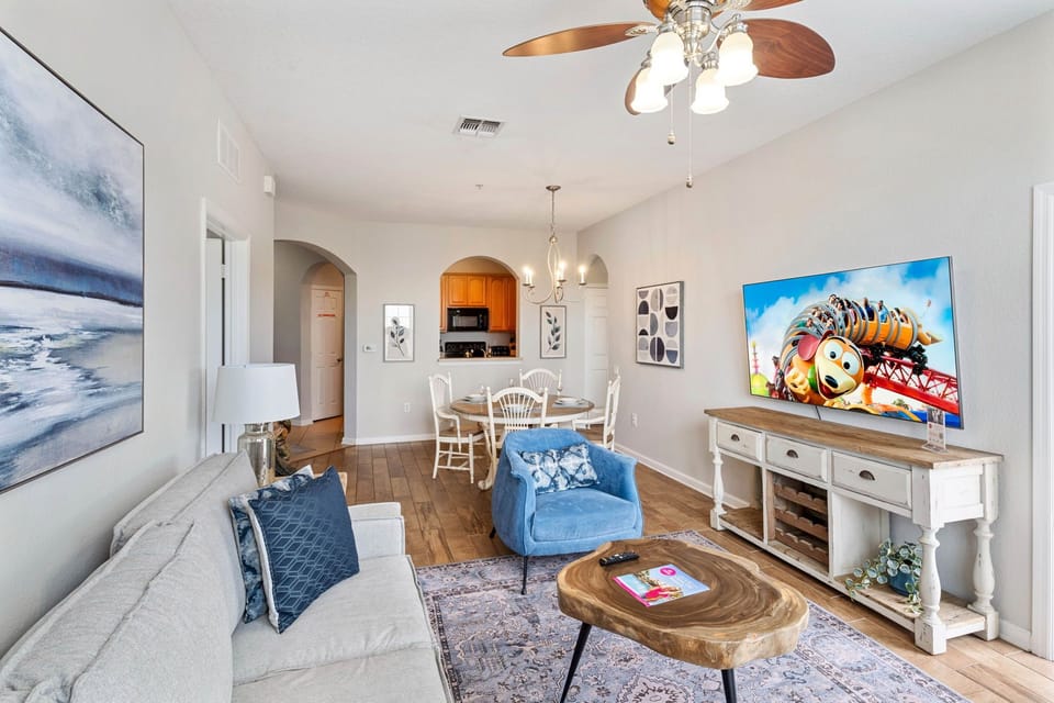 The living area is thoughtfully designed with a smart TV, offering entertainment and relaxation for guests to unwind and enjoy their favorite shows or movies.