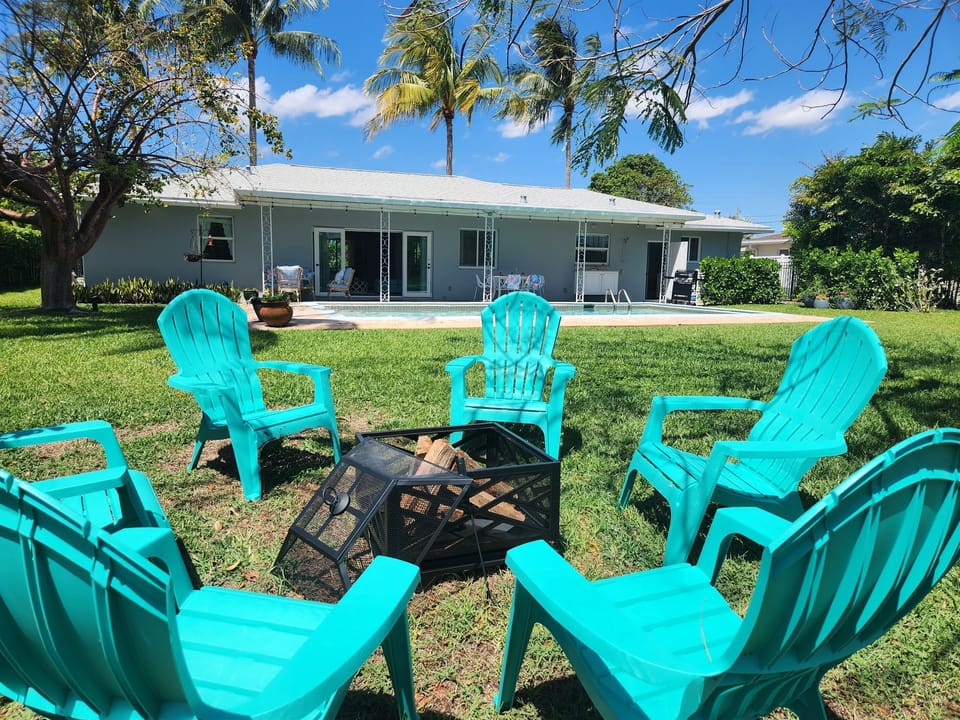 There are Adirondack chairs that surround a wood-fired firepit, the perfect viewing spot to watch the boaters, jetskis, and outstanding birdlife