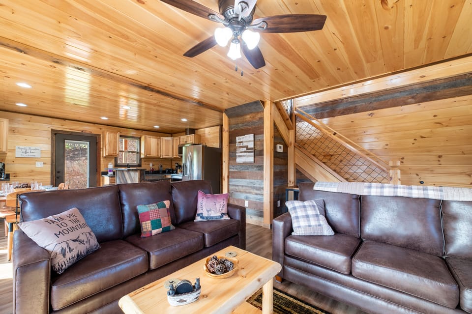 Cozy living space to watch tv while being open to kitchen area