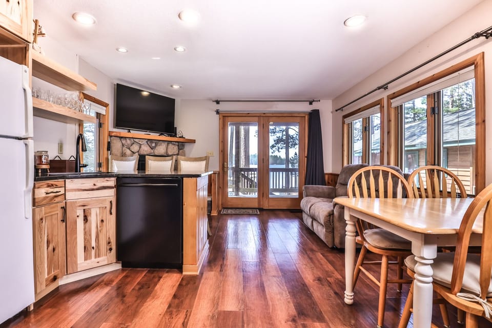 Warm, rich wooden floors extend throughout the lower-level.