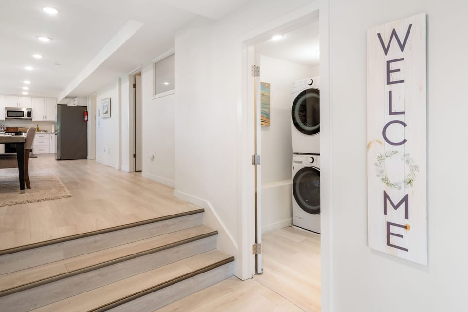 Kitchen and laundry area with convenient in-home amenities.