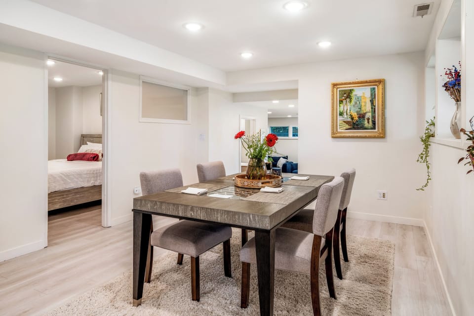 Private bedroom space with dining area and comfortable bed.